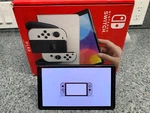 Nintendo Switch Oled Handheld Console 64GB Model: HEG-001 Tablet Only Used. Price: $169.99.