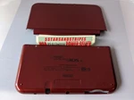 Nintendo Red / Burgundy Top & Battery Cover Housing Shell. Price: $43.95.