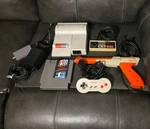 Nintendo Top Loader Console NES-101 Oem Dog Bone Controller Tested Working Used. Price: $250.00.