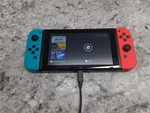 Nintendo Switch Handheld HAC-001 (PS5003299) Used. Price: $224.99.