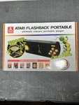 Atari Flashback Portable Player Console 60 Preloaded Built-in Games Open. Price: $29.99.
