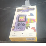 Merkury Innovations Arcade Fun Handheld Console Purple 200 Games Rechargea New. Price: $15.00.