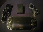 Sony Playstation Vita Crystal Black Gaming Handheld System With Modifications Used. Price: $275.00.