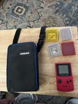 GBC-001 Boy/wild Berry And 5 Games Carrying Case Used. Price: $150.00.
