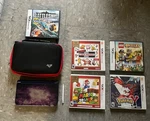 Nintendo New 3DS Xl Galaxy Edition Purple Wi-fi W/ Games & Carrying Case. Used. Price: $400.00.