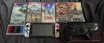 Nintendo Switch 32GB Blue Red Joy-cons With Games 64GB Microsd Used. Price: $300.00.