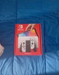 Nintendo Switch Oled Model HEG-001 Handheld Console 64GB White Usato. Price: $255.75.