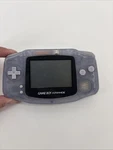 Nintendo Game Boy Advance Glacier Handheld System Including Used. Price: $90.00.
