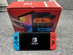 Nintendo Switch Oled Handheld Console 64GB Model: HEG-001 With B/r Joycon Used. Price: $189.99.