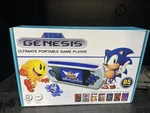 Sega Genesis Ultimate Portable Player With 85 Games - White New. Price: $180.00.