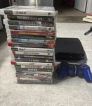 Sony Playstation 3 Slim Console Bundle With Controller & 20 Games - Works Read Used. Price: $199.99.