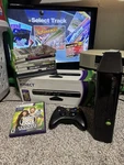 Xbox 360 Console Bundle Sealed Kinect Controller + 10 Games Tested Works Black Used. Price: $200.00.