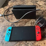 Nintendo Switch Oled Console Neon Blue & Red Joy-con, Dock, Power Adapter, Wi-fi Used. Price: $200.00.