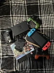 Nintendo Switch 3 Controllers 10 Games Travel Case+ Charging Dock Used. Price: $375.00.