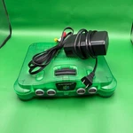 Nintendo 64 Jungle Green Video Game Console Authentic Tested Working W/ Cords Used. Price: $129.99.