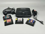 Sega Genesis Model 2 MK-1631 Console W/controller & 4 Games Very Good Tested Used. Price: $69.99.