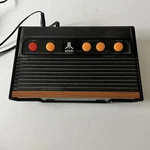 Atari Flashback Classic Game Console With 2 Controllers Used. Price: $10.50.
