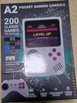 Shockwave A2 Pocket Gaming Console White 200 Games Controller Included New. Price: $26.00.