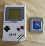 Nintendo Game Boy DMG-01 Gray Handheld Console W/ Tetris Cartridge Used. Price: $104.00.