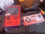 Box Plus 500 In Handheld With Controller Red Color, Has Games New. Price: $29.00.