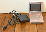 Authentic Nintendo Game Boy Advance Sp Gba Pearl PINK-AGS-001 Charger Used. Price: $149.99.