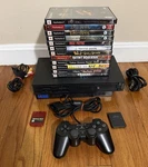Sony PS2 Fat Console SCPH-39001 Bundle With 12 Games Lord Of The Rings , Etc Used. Price: $199.95.