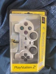 New Sony PS2 Playstation Dualshock - Satin Silver Sealed!. Price: $115.00.