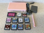 Nintendo Lite USG-001 Handheld System, Pink, 11 Games Used. Price: $79.00.