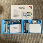 Nintendo Wii + Console - Box Great Shape Used. Price: $123.00.
