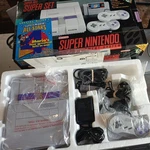 Nintendo Super Nes Set Practically New Manuals And No Games Box Open. Price: $1299.99.
