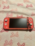 Nintendo Switch Lite 32 Gb Gaming Console - Coral Used. Price: $150.00.
