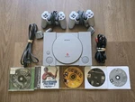 Sony Playstation 1 W/ 2 Dualshock Controllers & 7 Games Used. Price: $94.99.