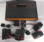 Atari 2600 Woody Woodgrain 4 Switch Game Console - Tested Working Used. Price: $100.00.
