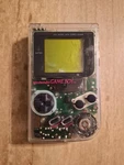 Clear White Nintendo Game Boy Original DMG-01 Handheld System Tested Works Used. Price: $80.00.