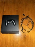 Sony Playstation 4 Black Console Hdmi Usb Wi-fi With Controller And Cable Used. Price: $100.00.