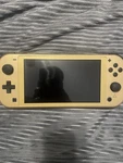 Nintendo Switch Lite Hyrule Edition New Used. Price: $195.00.
