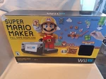 Nintendo Wii Controllers! & Sensor Bar, Super Mario Maker 32GB Black Used. Price: $299.99.
