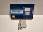 Nintendo 2DS Crystal Blue Handheld Console Bundle With Original Box Tested Used. Price: $399.99.