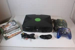 Microsoft Original Xbox Console Bundle W/ 2 Controllers, 5 Games, Cords, Tested Used. Price: $134.99.