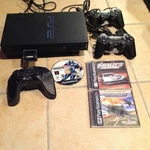 Sony Playstation PS2 Fat Console SCPH-50001 With 3 Games Controllers Tested Used. Price: $175.00.
