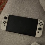 Nintendo Switch Oled Model White Handheld Console Wi-fi Usb-c Internet Browsing New. Price: $285.00.