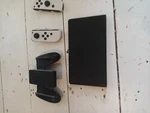 Nintendo Switch Oled Comes With Doc Screen Grip And Joy Cons Used. Price: $250.57.