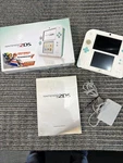 Nintendo 2DS Sea Green Handheld System Console Model FTR-001 With Box & Manual Used. Price: $225.00.