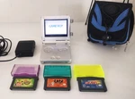 Nintendo Boy Advance Gba Sp Platinum Silver System With Mag, 3 Games & Case Used. Price: $199.99.