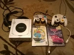 Nintendo Gamecube Platinum Console With Mario Sunshine And Disney Cars Used. Price: $100.00.