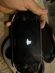 Sony Playstation Vita Handheld System - Black (22031) Open. Price: $235.00.